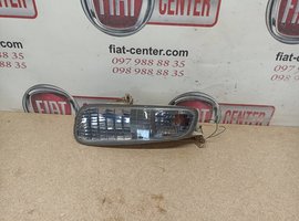 Повторювач повороту лівий в передній бампер