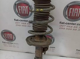 Амортизатор передній лівий