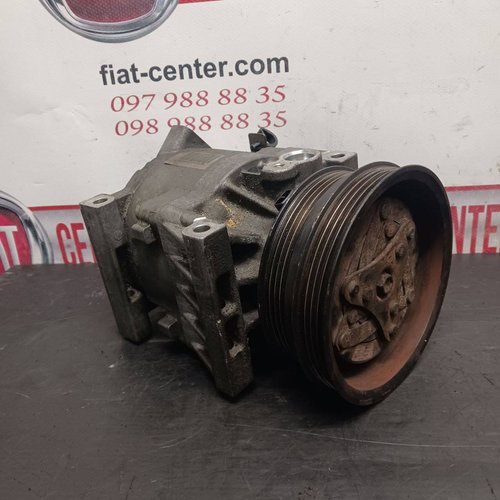 Компресор кондиціонера 1,2