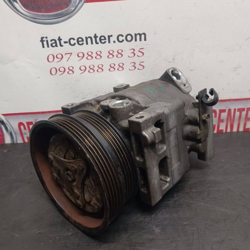 Компресор кондиціонера 1,2